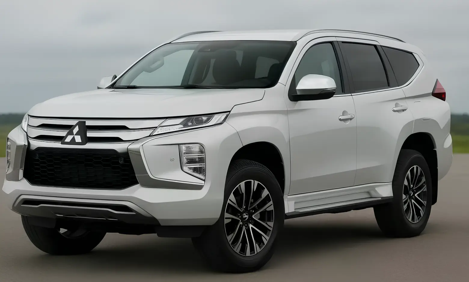 Mitsubishi Pajero Sport продажі: білий позашляховик на офіційному зображенні