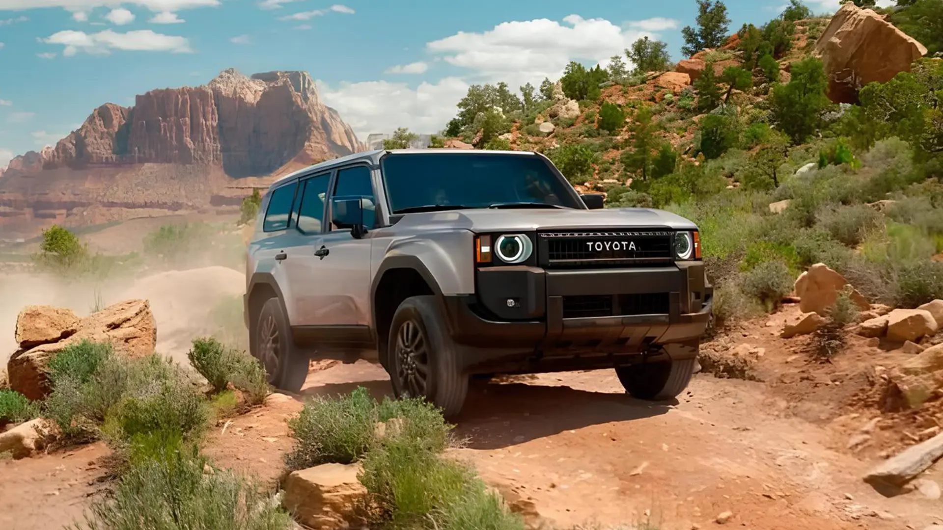 Позашляховик Toyota Land Cruiser на бездоріжжі серед скель і пустельного ландшафту