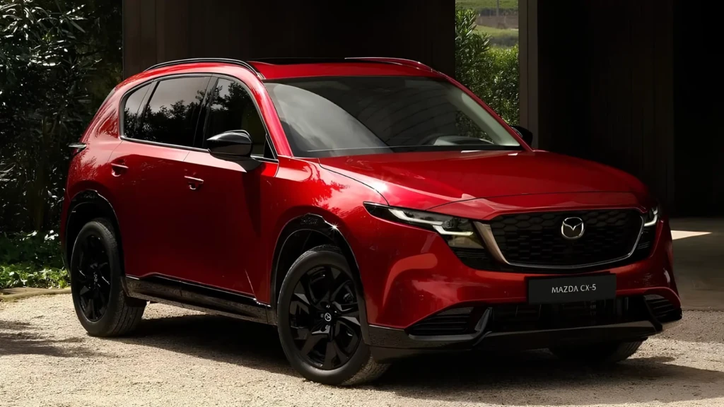 Mazda CX-5 Hybrid червоного кольору, вид спереду збоку