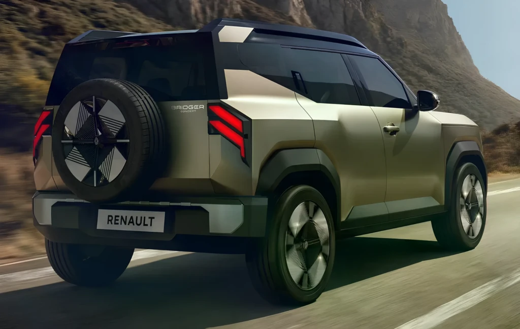 Renault Bridger Concept сзади: бежевый кроссовер с запаской на двери багажника на горной дороге