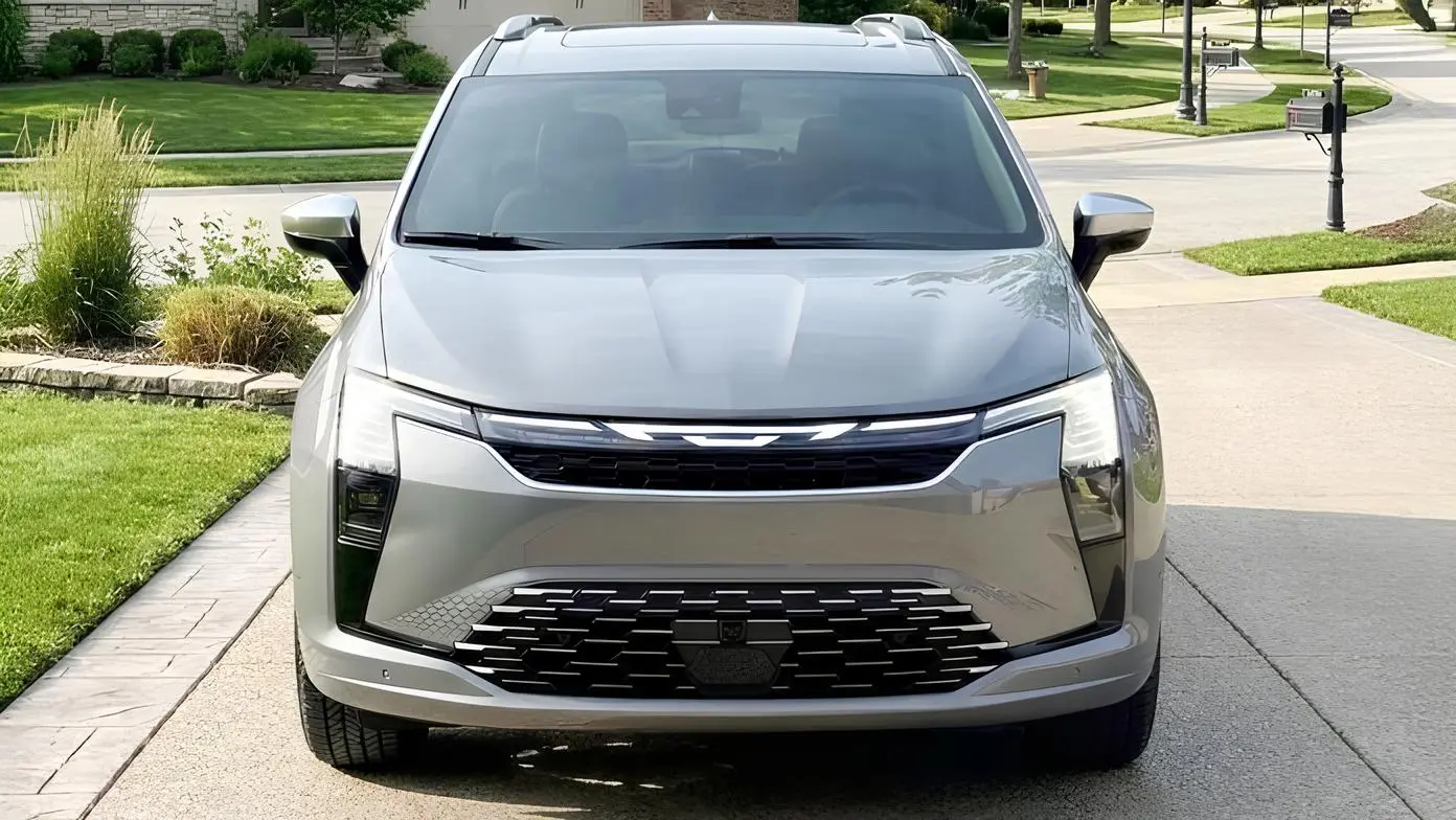 Chrysler Pacifica 2027 спереду: мінівен у світлому кольорі з вузькою LED-оптикою та великою решіткою