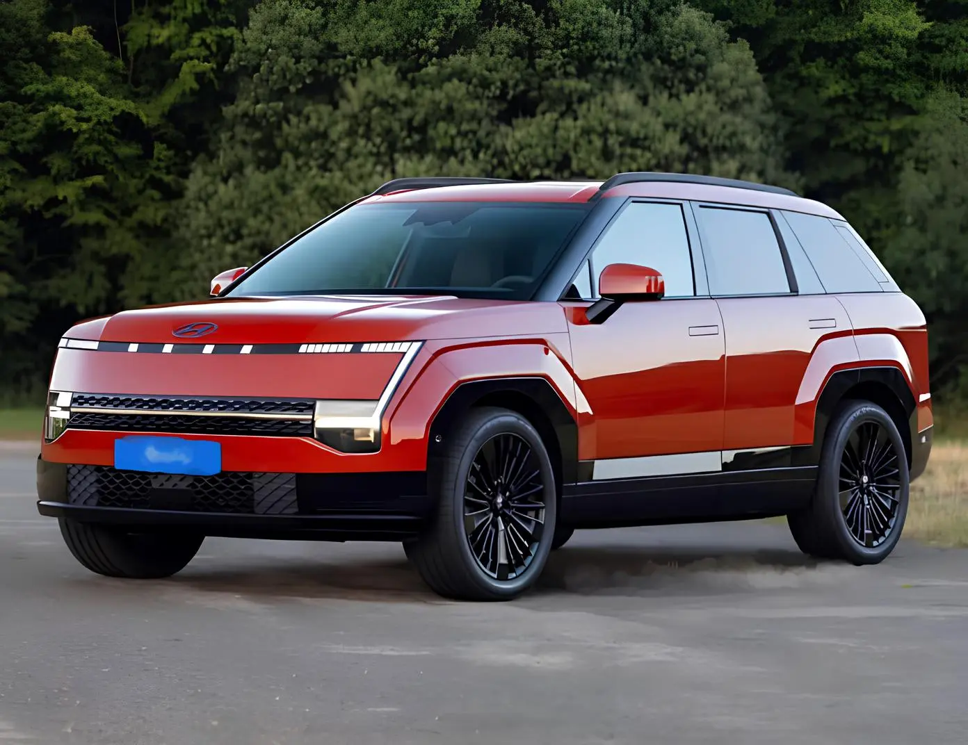 Червоний великий кросовер Hyundai у трьохчвертному ракурсі спереду, піксельна LED-оптика та двоколірний кузов