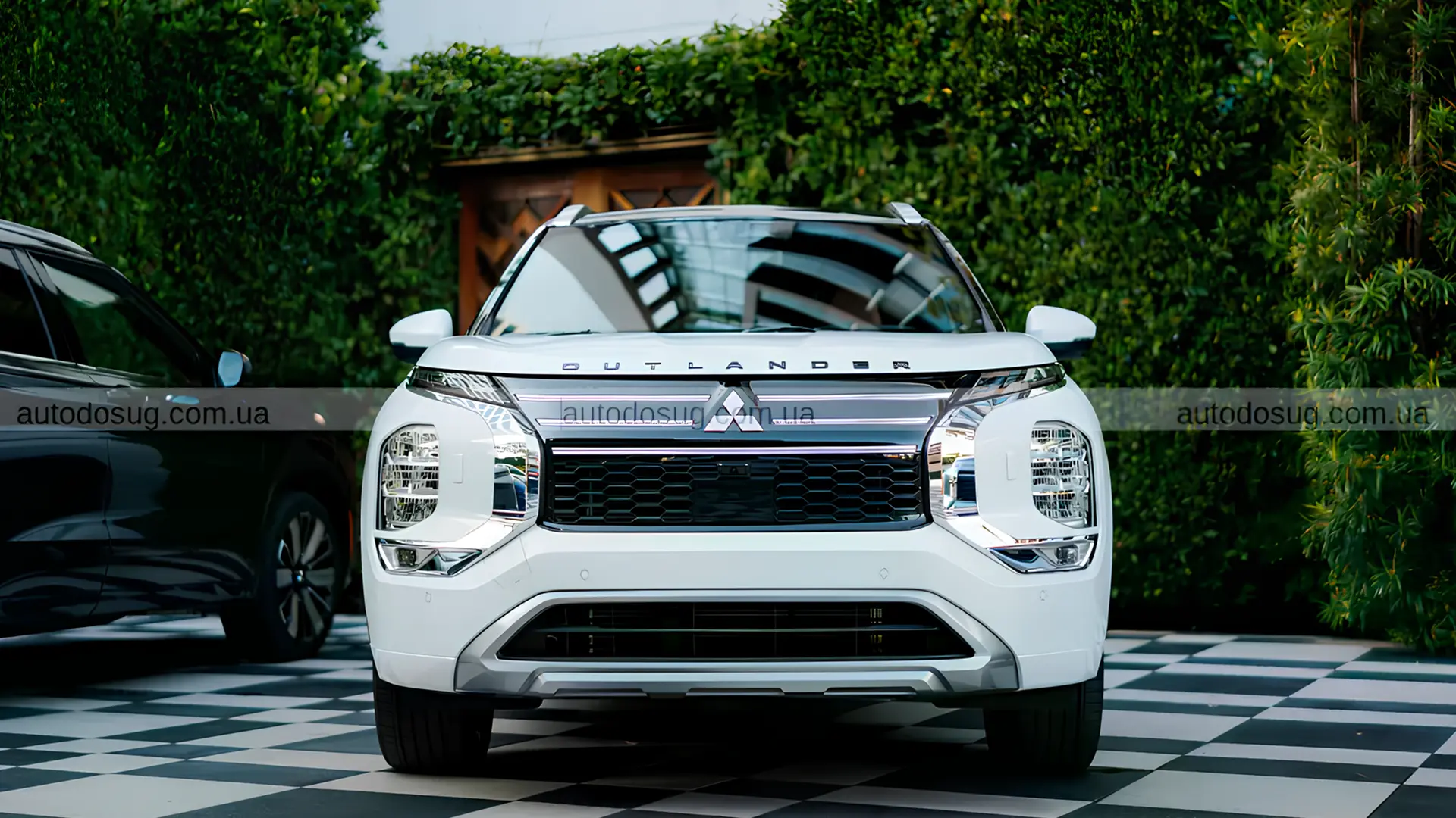 Mitsubishi Outlander 2026 спереду на презентації