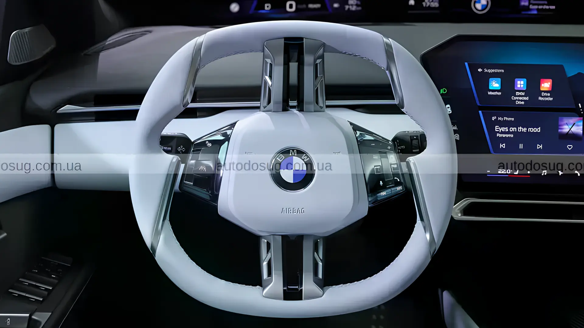 Кермо BMW в салоні автомобіля з цифровою панеллю приладів і мультимедійним дисплеєм