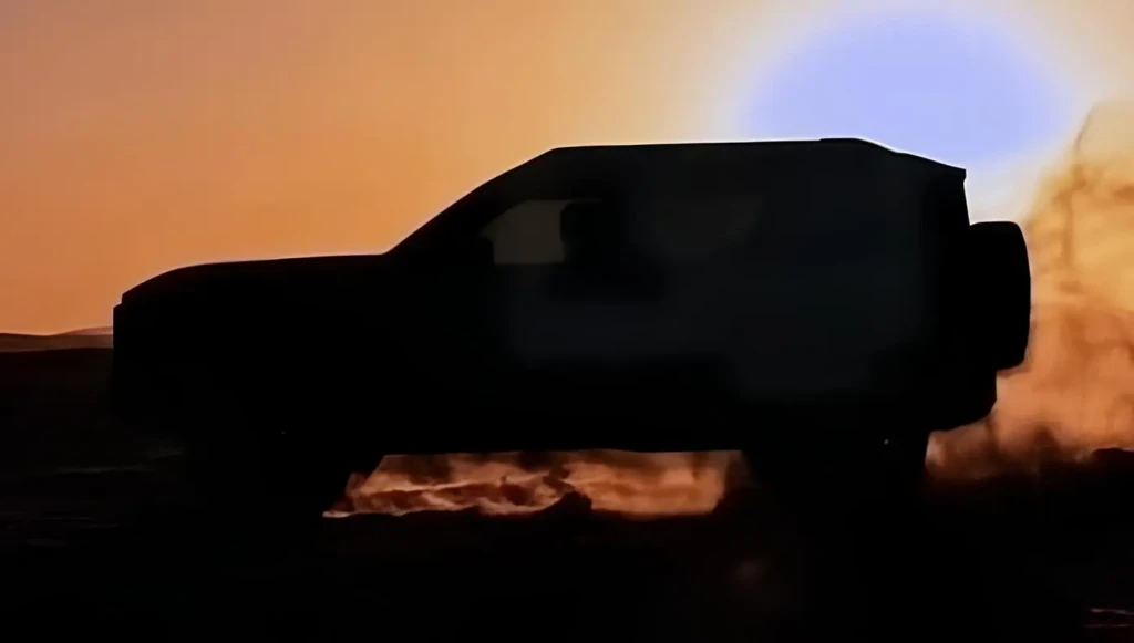 Передня частина жовтого позашляховика Nissan Xterra на тизерному зображенні під дощем