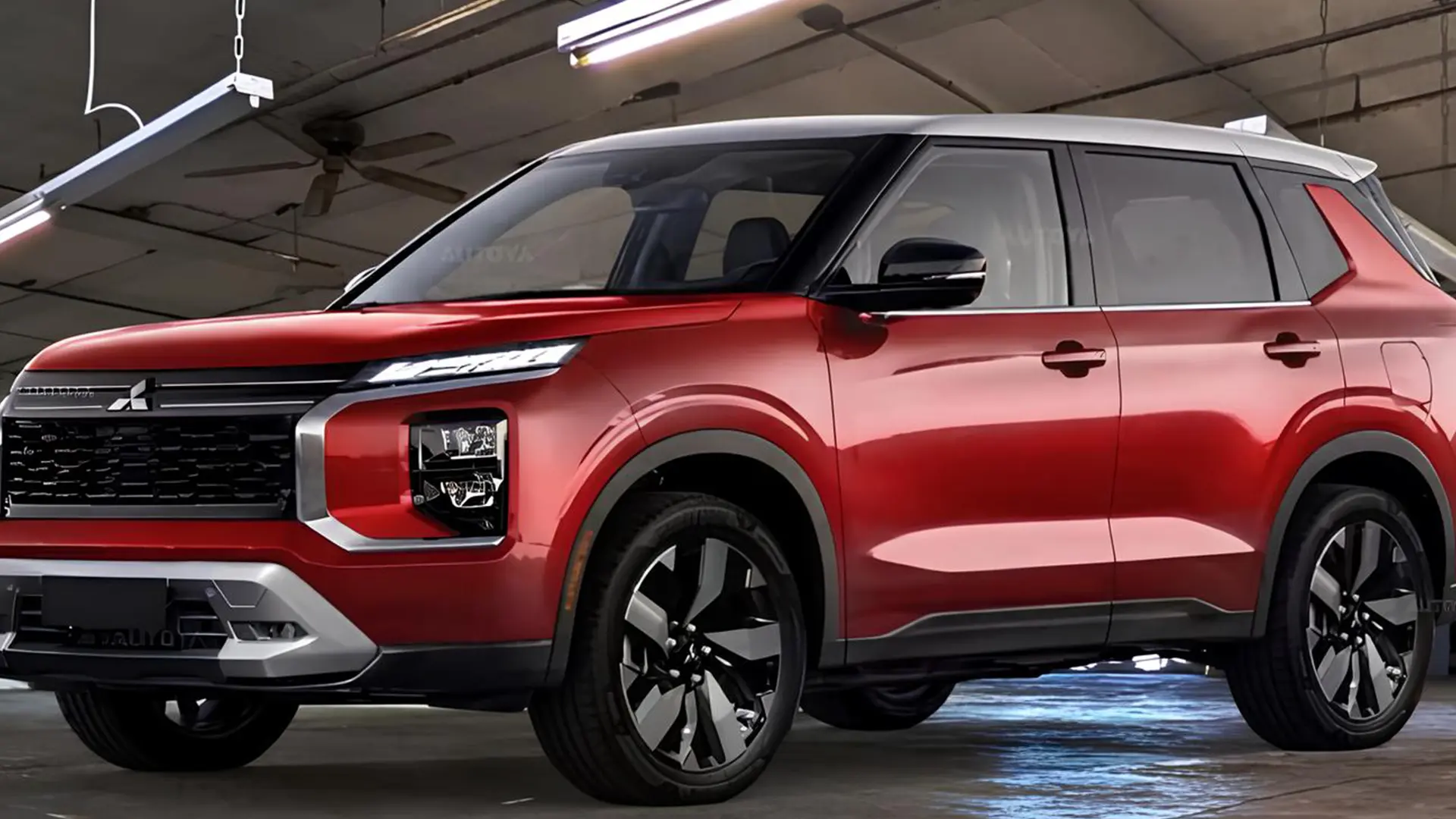 Новий Mitsubishi Outlander червоного кольору в паркінгу