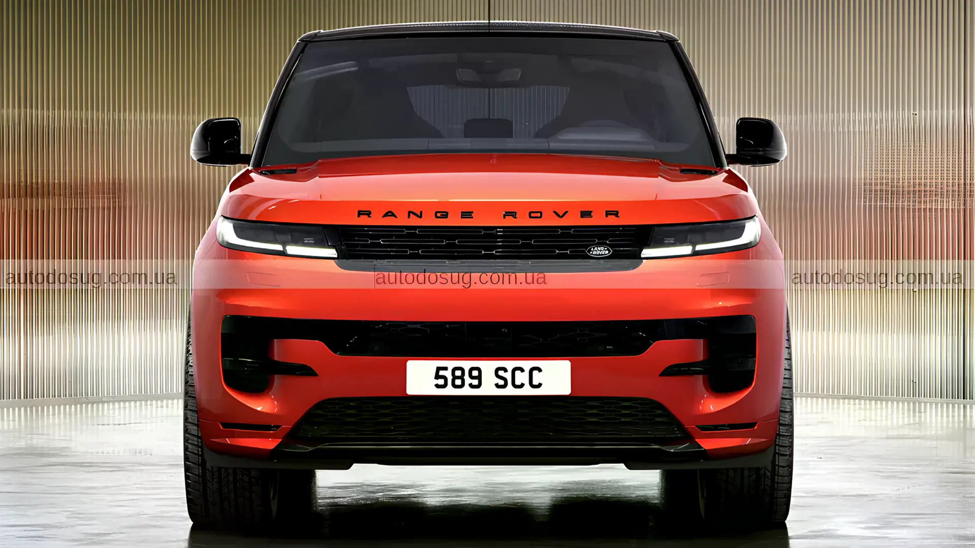 Range Rover Sport TWENTY Edition червоного кольору, вид спереду в студійному просторі