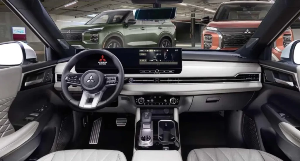 Новий Mitsubishi Outlander червоного кольору в паркінгу