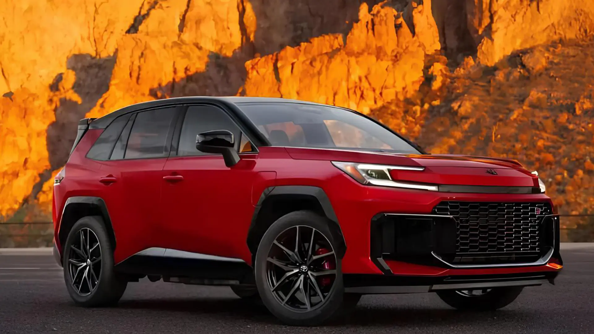 Червоний Toyota RAV4 2026 на тлі скелястого ландшафту