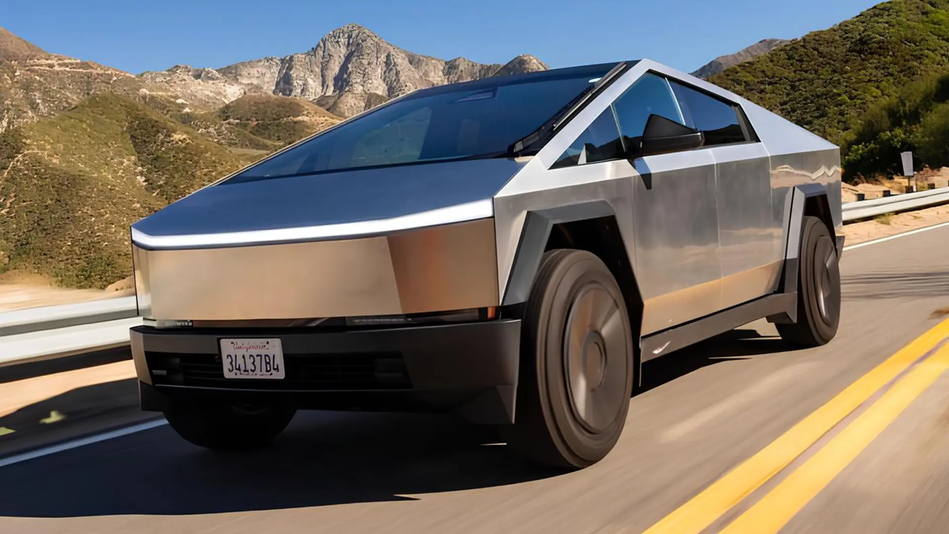 Tesla Cybertruck у русі на гірській дорозі