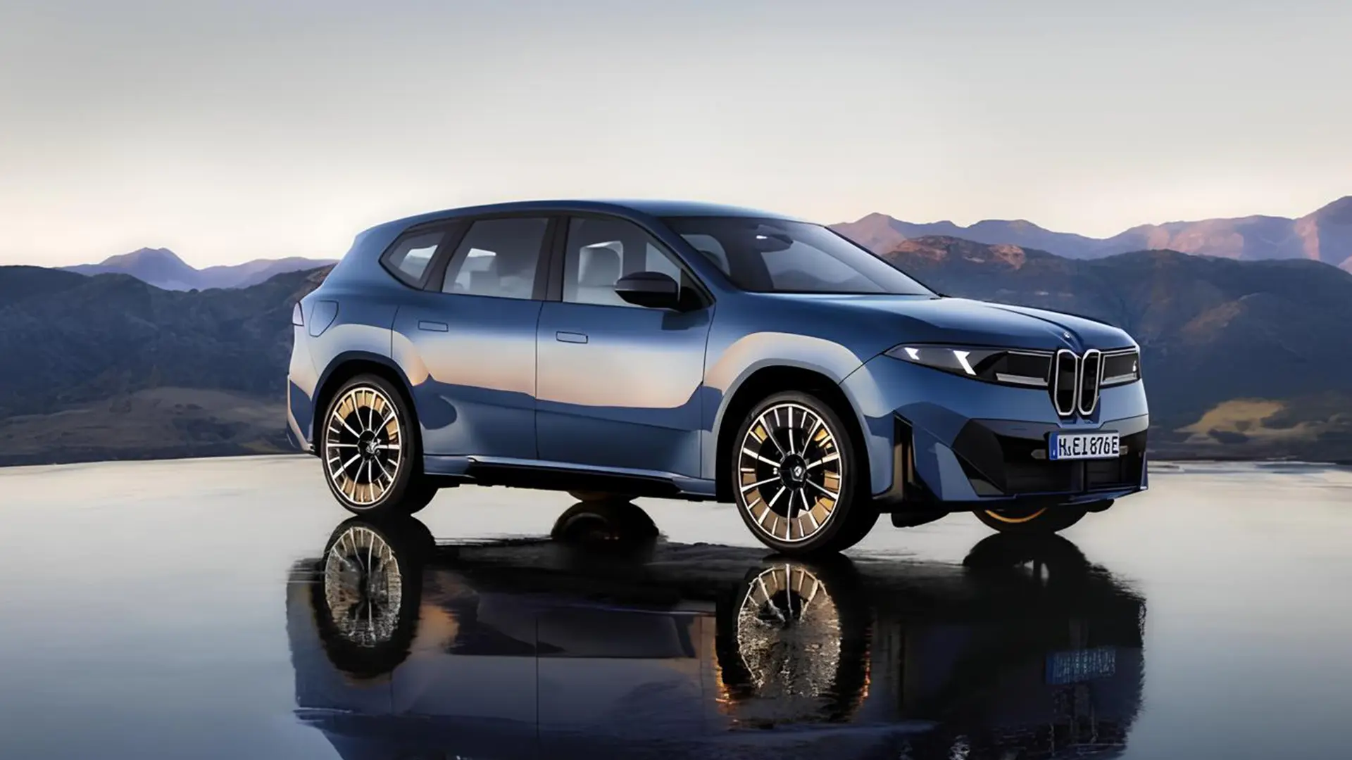 Синій BMW iX3 на тлі гірського пейзажу