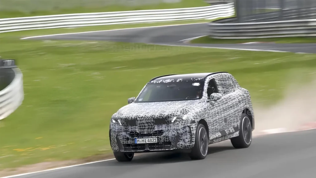 Новий BMW X5 у камуфляжі проходить дорожні випробування на треку