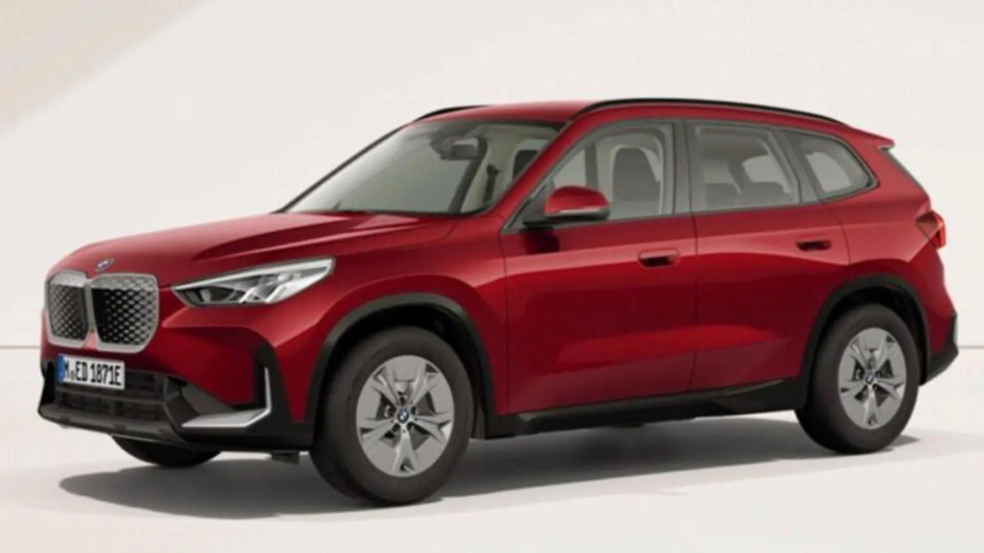 Червоний BMW iX1 у боковому ракурсі