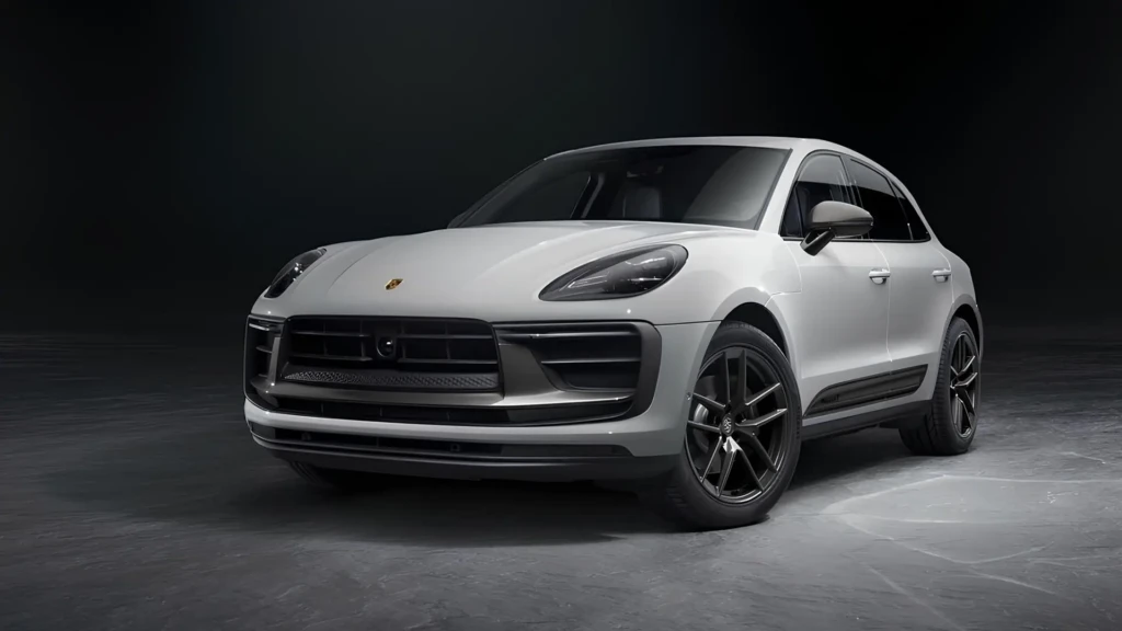 Білий Porsche Macan з ДВЗ у студії на темному фоні