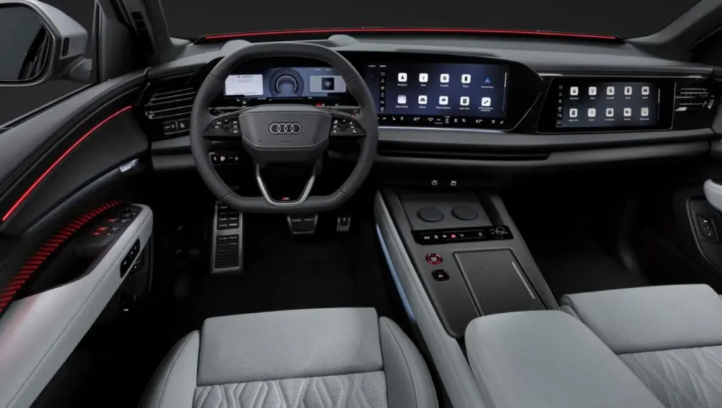 Камуфлированный Audi Q9 с открытыми дверями и светлым салоном
