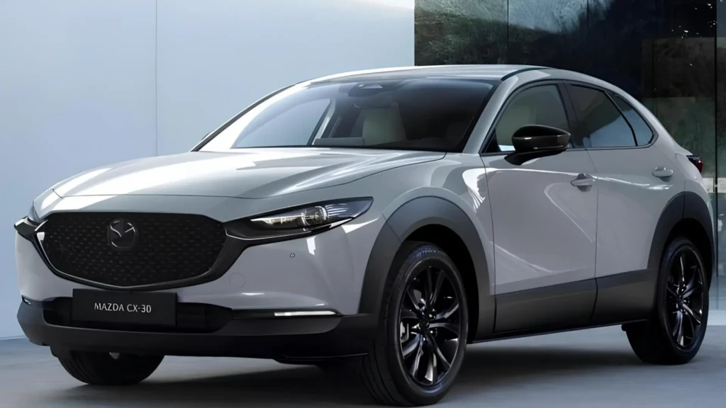Біла Mazda CX-30 2027 у студійному інтер’єрі